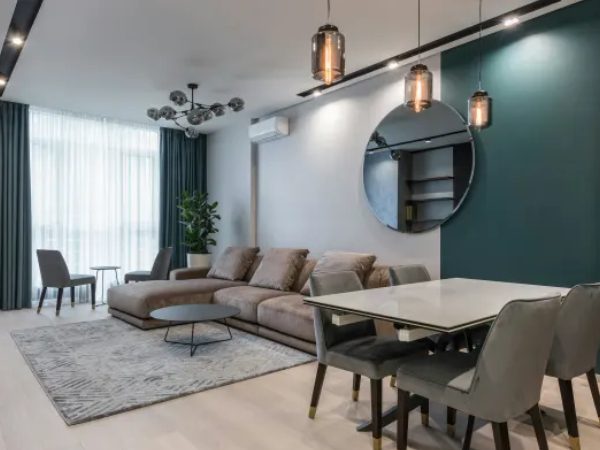 A living room with a table and chairs